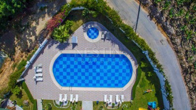 Новый комплекс от надежного застройщика в зеленой части Махмутлара фото 19