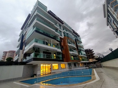 Квартира 1+1 в районе Тосмур в 300 метрах от моря фото 1