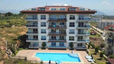 Садовый дуплекс 2+1 в районе Кестель в 200 метрах от моря фото 1