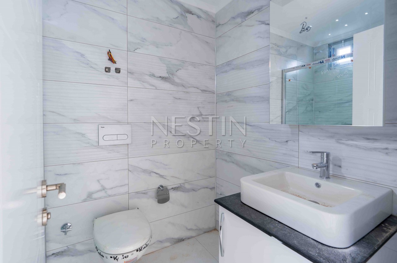 Квартиры 2+1 и пентхаус 4+1 в самом центре района Оба фото 31