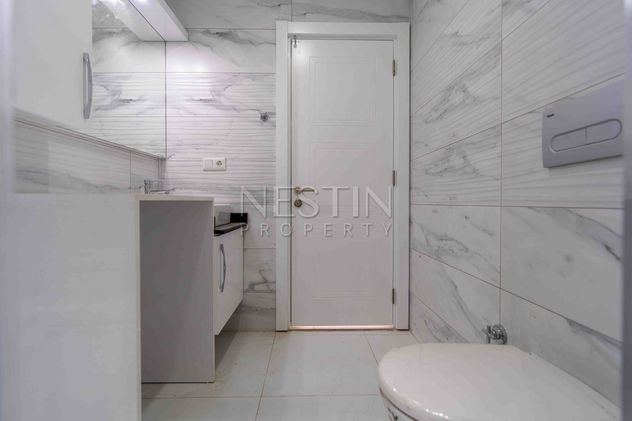 Квартиры 2+1 и пентхаус 4+1 в самом центре района Оба фото 32