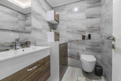 Квартира 2+1 класса люкс в Махмутларе с видом на прилегающию территорию фото 33