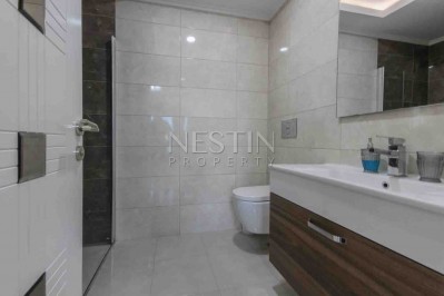 Квартира 2+1 класса люкс в Махмутларе с видом на прилегающию территорию фото 37