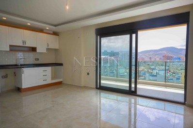 Квартира 2+1 на берегу моря в районе Махмутлар фото 1