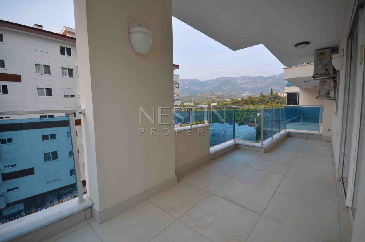 Большая квартира 2+1 в районе Махмутлар с видом на горы фото 12