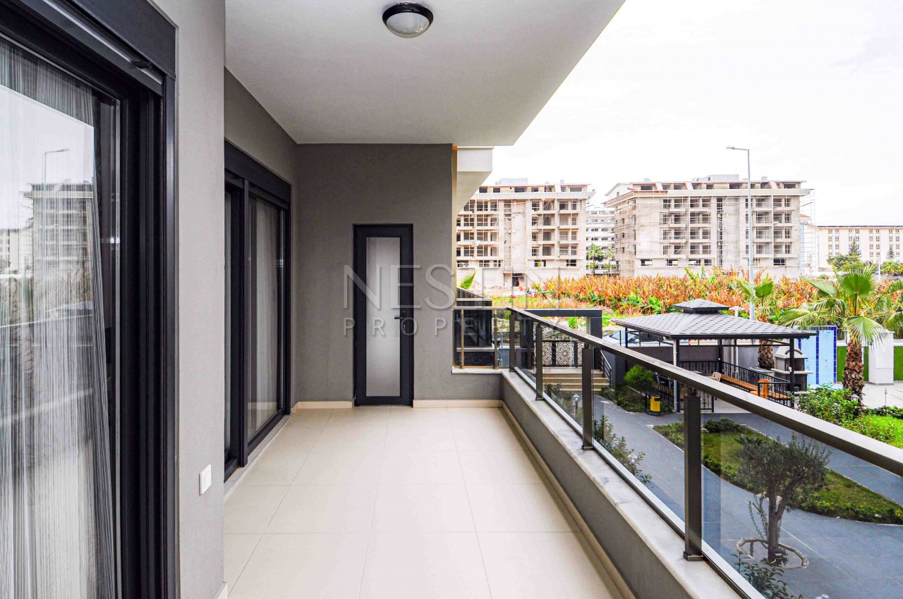 Садовый дуплекс 2+1 в хорошем жилом комплексе в районе Каргыджак фото 21