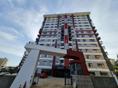 Просторная квартира в новом комплексе 3+1 в центре Махмутлара в 350 метрах от моря фото 1