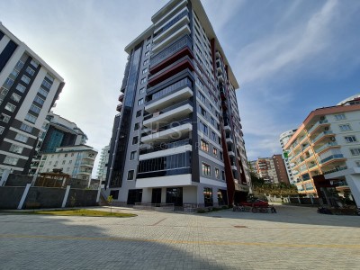 Просторная квартира в новом комплексе 3+1 в центре Махмутлара в 350 метрах от моря фото 2