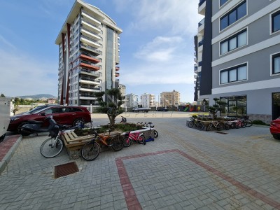 Просторная квартира в новом комплексе 3+1 в центре Махмутлара в 350 метрах от моря фото 4