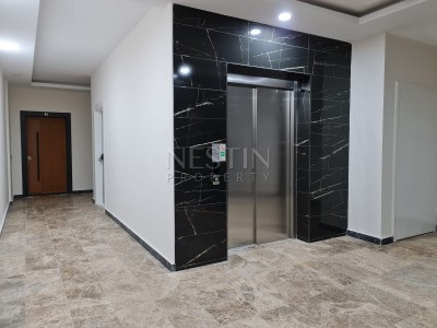 Просторная квартира в новом комплексе 3+1 в центре Махмутлара в 350 метрах от моря фото 11