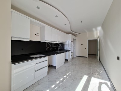 Просторная квартира в новом комплексе 3+1 в центре Махмутлара в 350 метрах от моря фото 15