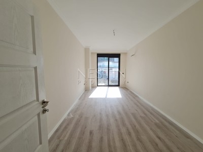 Просторная квартира в новом комплексе 3+1 в центре Махмутлара в 350 метрах от моря фото 20