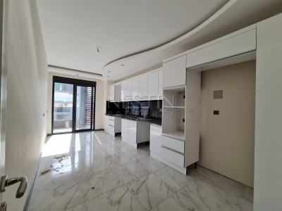 Просторная квартира в новом комплексе 3+1 в центре Махмутлара в 350 метрах от моря фото 23