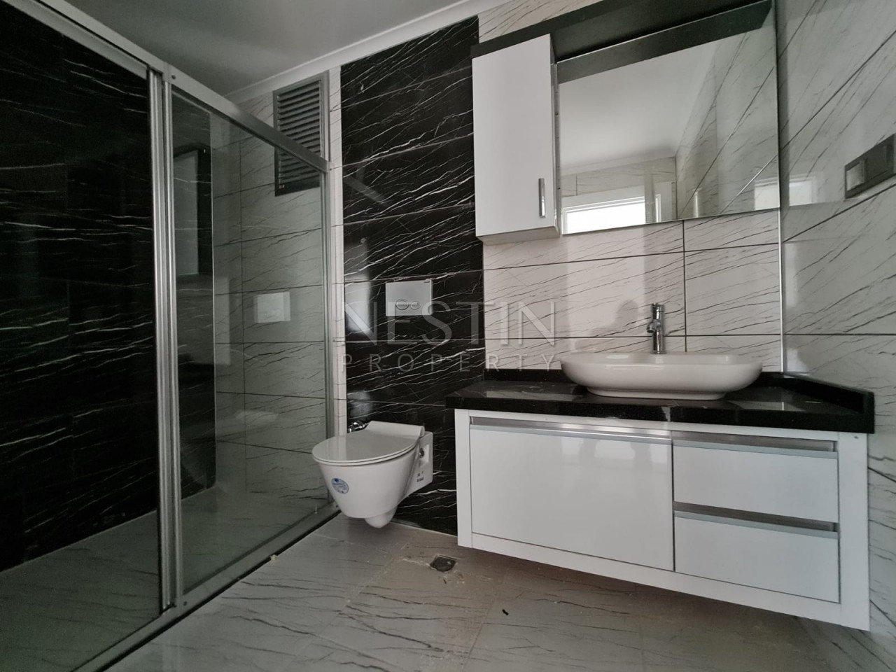 Просторная квартира в новом комплексе 3+1 в центре Махмутлара в 350 метрах от моря фото 26