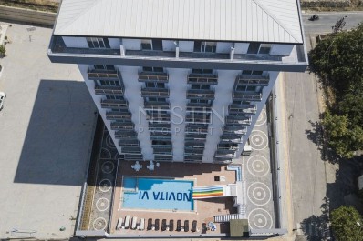 Уютная квартира 1+1 в новом доме в Махмутларе фото 3