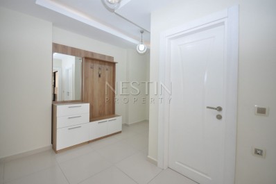 Кваритра 2+1 в современном комплексе в Махмутларе фото 12