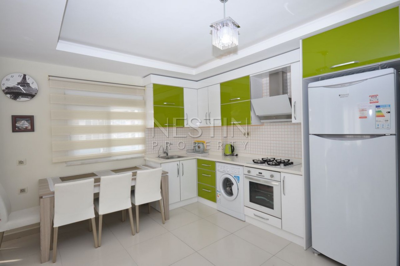 Кваритра 2+1 в современном комплексе в Махмутларе фото 18