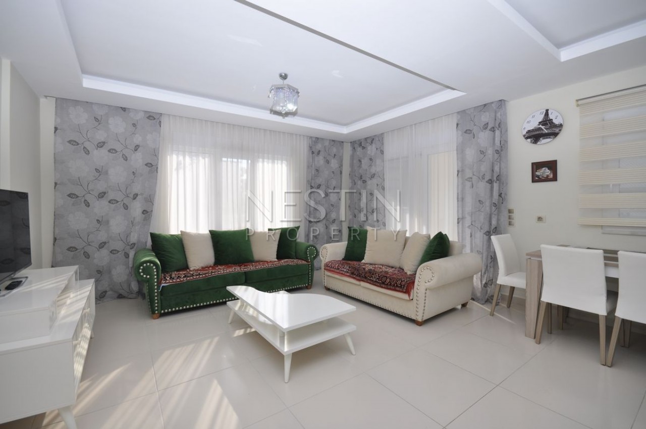 Кваритра 2+1 в современном комплексе в Махмутларе фото 19