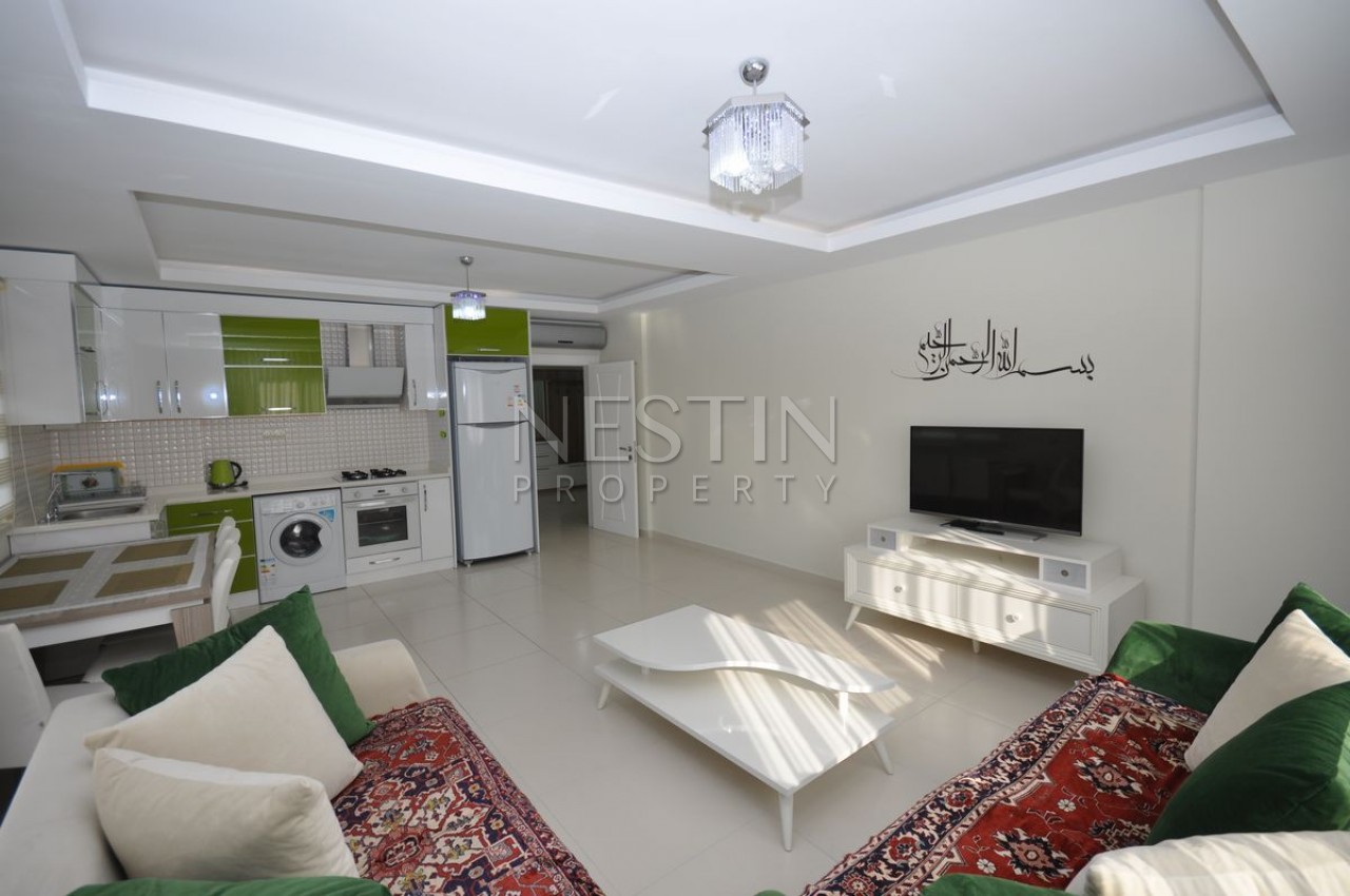 Кваритра 2+1 в современном комплексе в Махмутларе фото 20