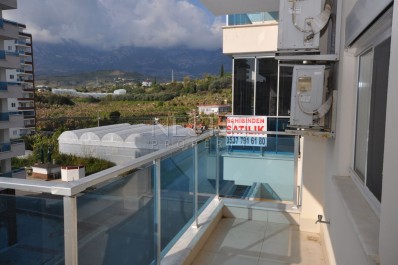 Кваритра 2+1 в современном комплексе в Махмутларе фото 24