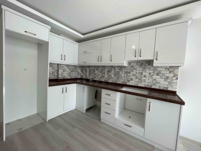 Квартира 2+1 в районе Махмутлар с видом на море и горы фото 9