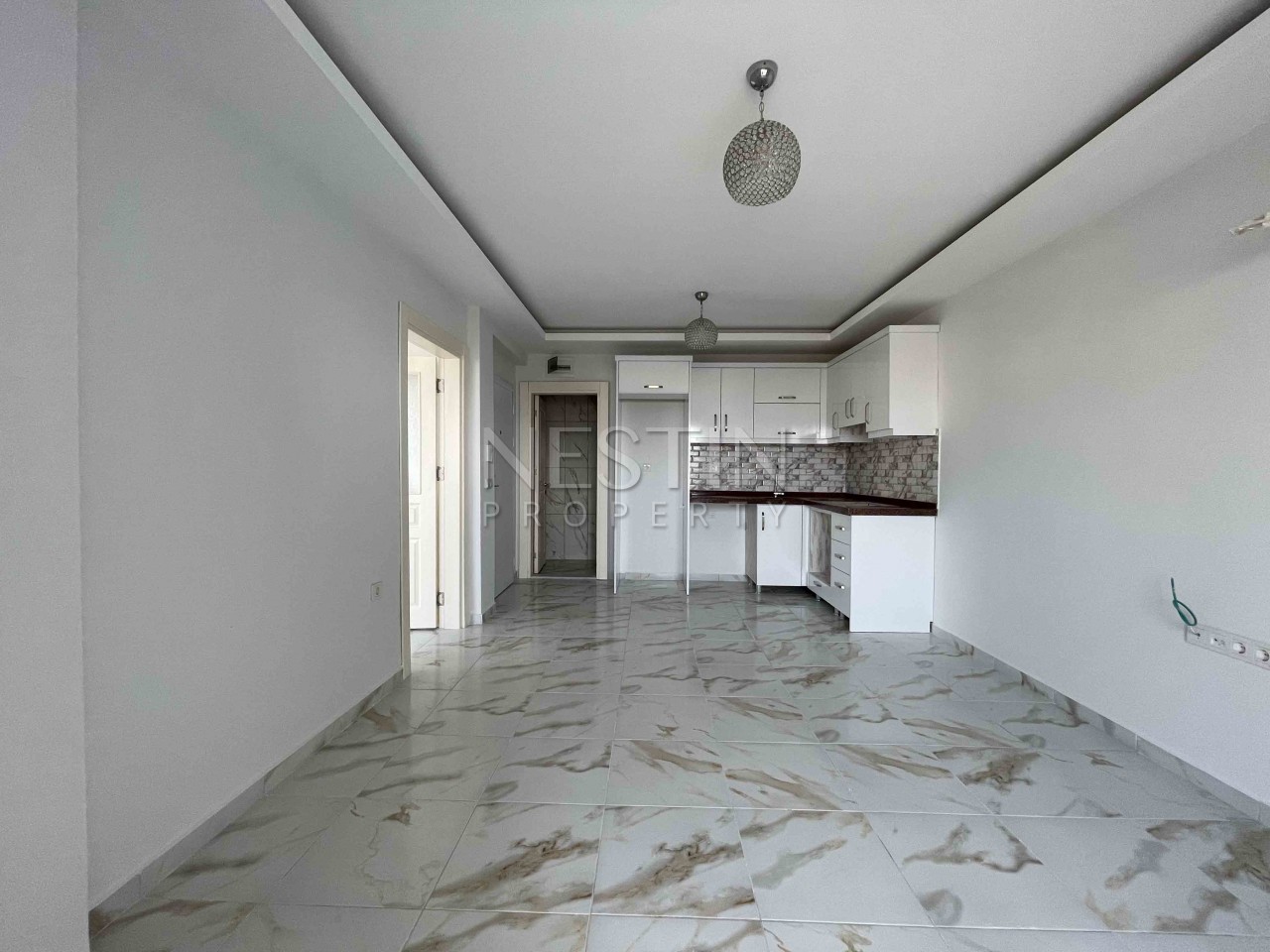 Квартира 1+1 в районе Махмутлар с панорамным видом на горы фото 5