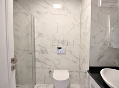 Квартиры в новом жилом комплексе в районе Махмутлар фото 31