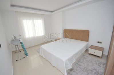 Большая квартира 1+1 в районе Махмутлар с видом на горы фото 24