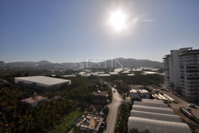 Большая квартира 1+1 в районе Махмутлар с видом на горы фото 30