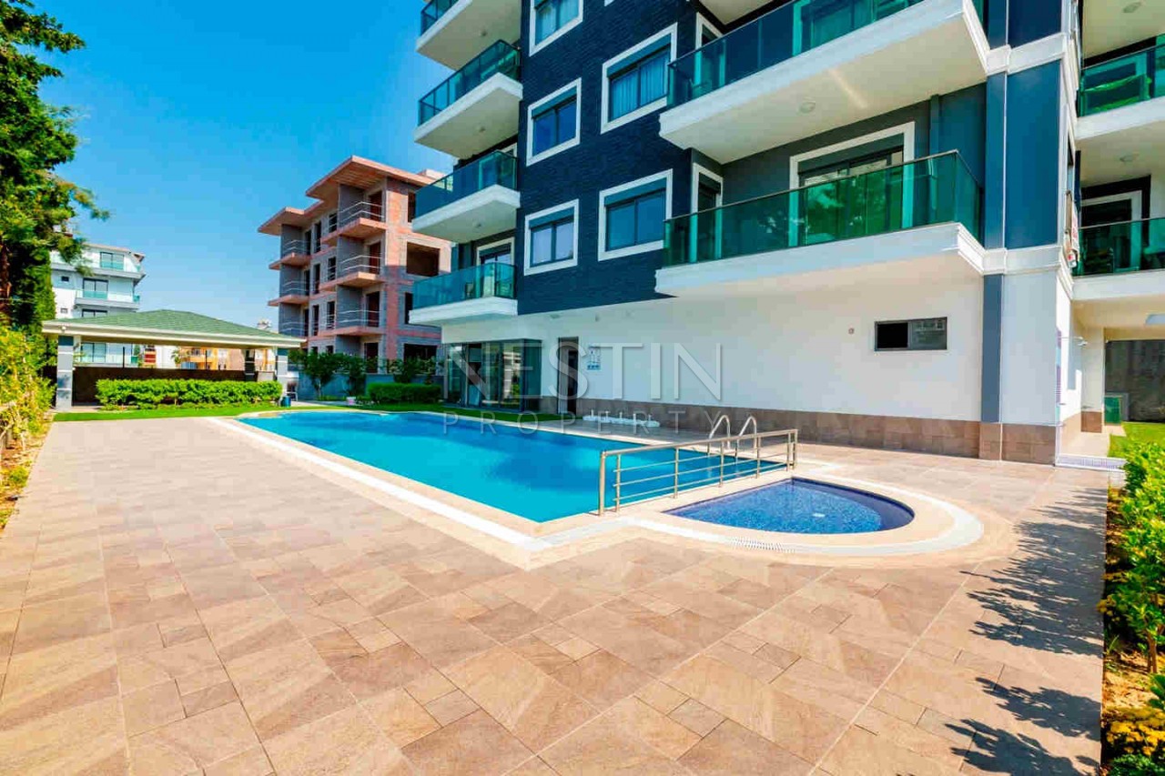 Стильная квартира планировкой 1+1 в районе Авсаллар фото 6