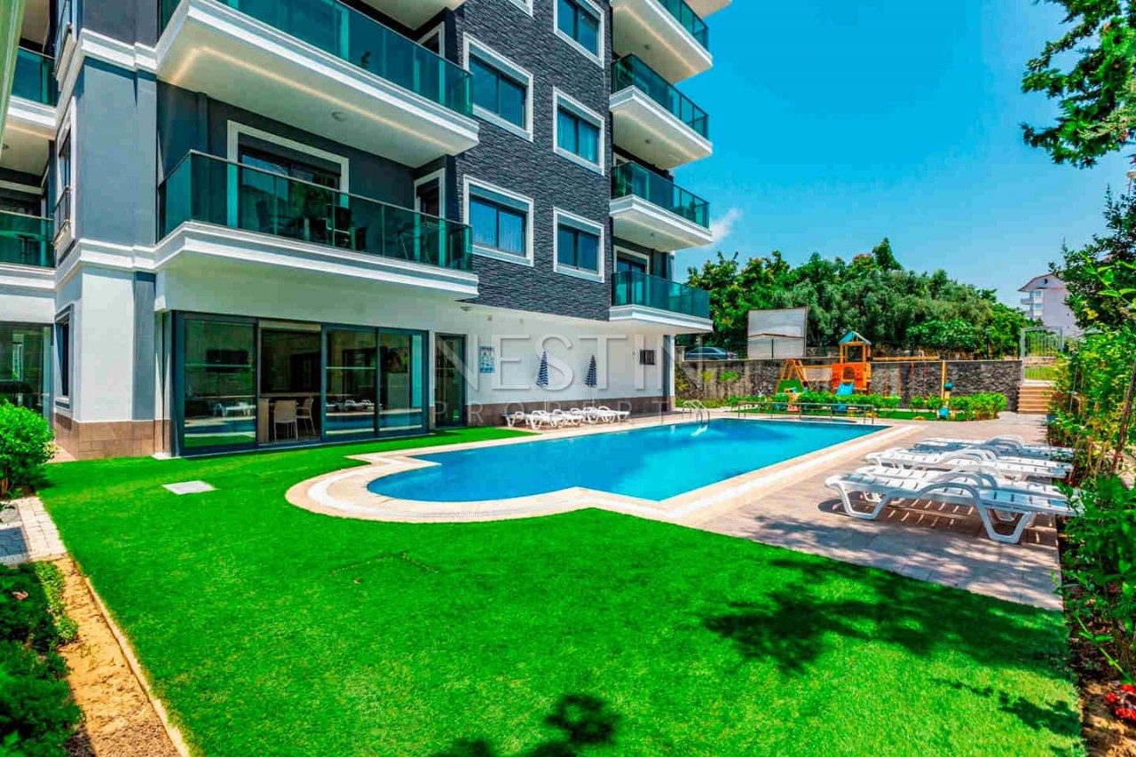 Стильная квартира планировкой 1+1 в районе Авсаллар фото 7