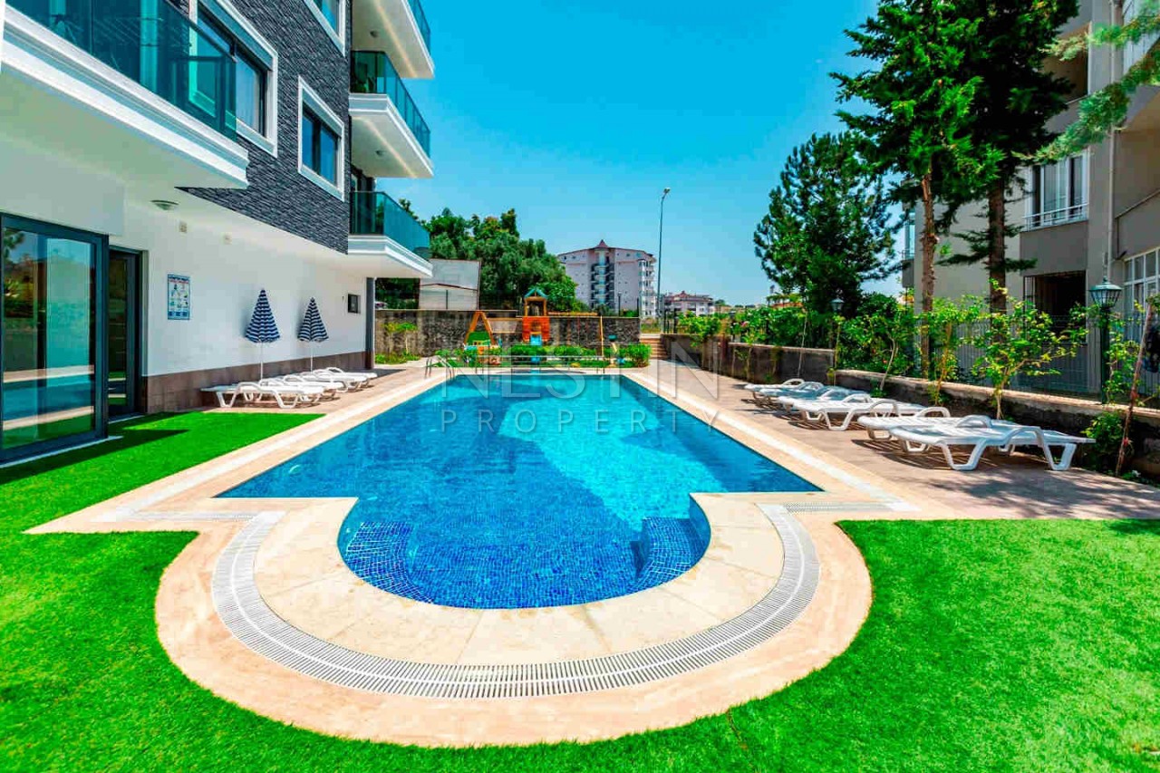 Стильная квартира планировкой 1+1 в районе Авсаллар фото 8