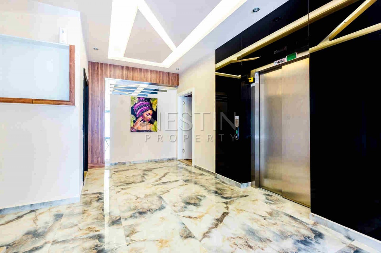 Стильная квартира планировкой 1+1 в районе Авсаллар фото 12