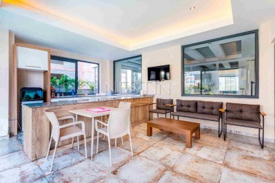 Стильная квартира планировкой 1+1 в районе Авсаллар фото 14