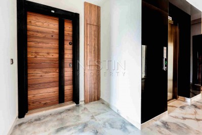 Стильная квартира планировкой 1+1 в районе Авсаллар фото 18