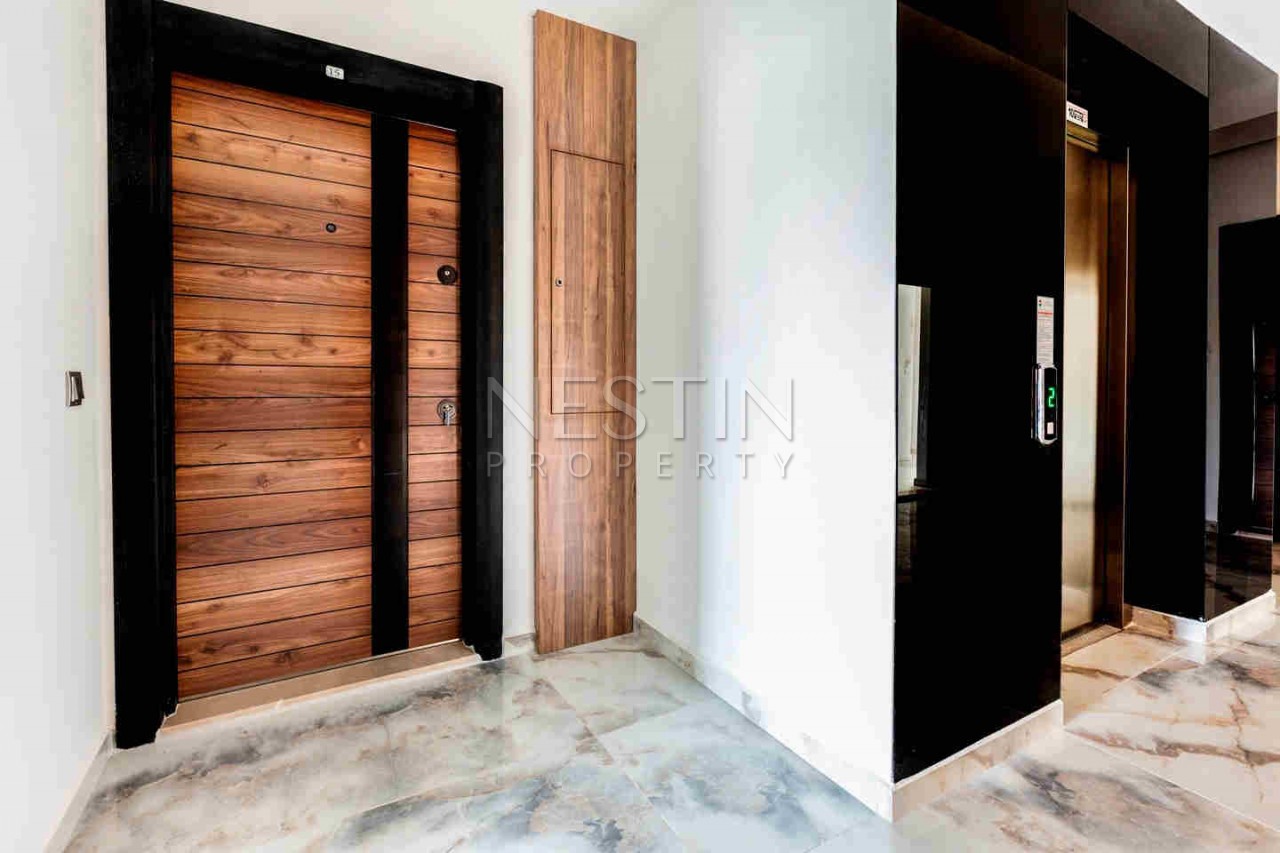 Стильная квартира планировкой 1+1 в районе Авсаллар фото 18