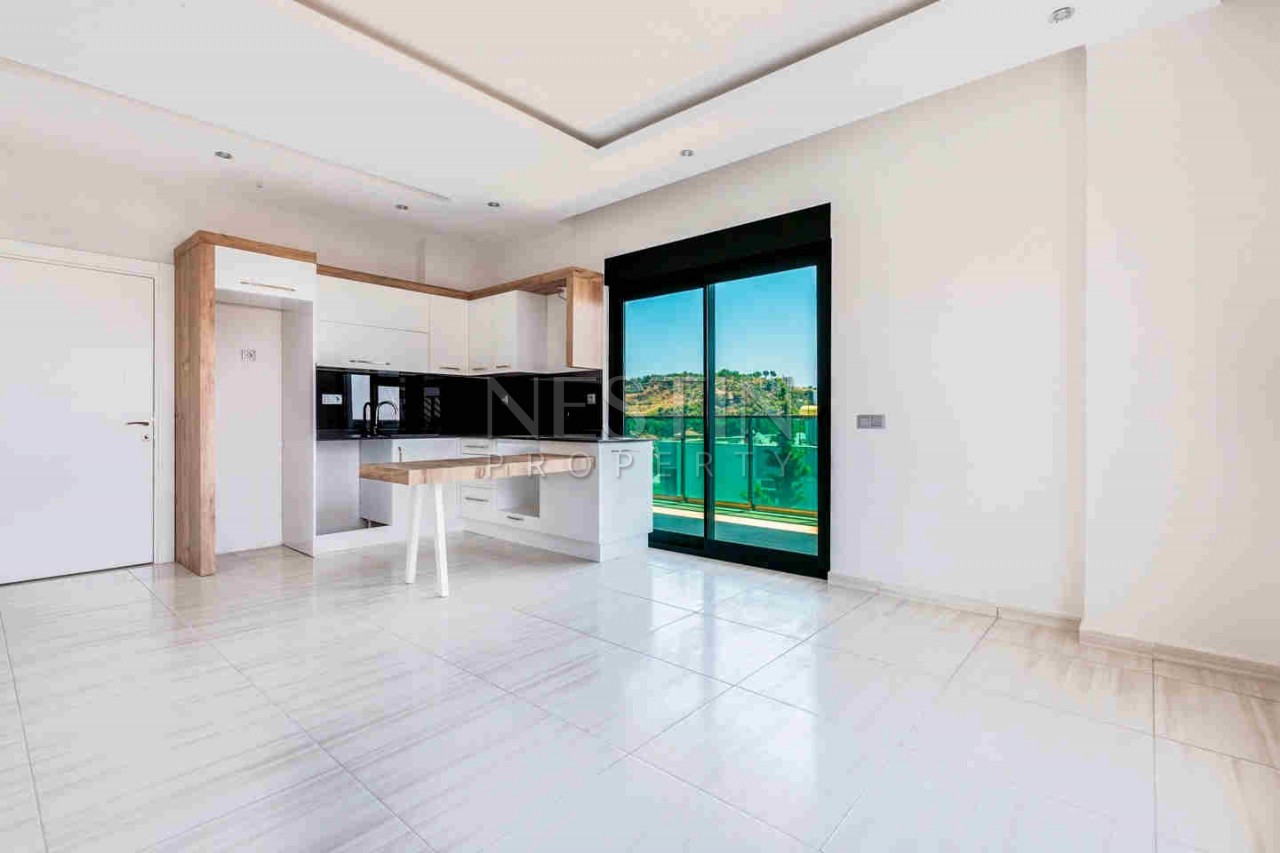 Стильная квартира планировкой 1+1 в районе Авсаллар фото 22