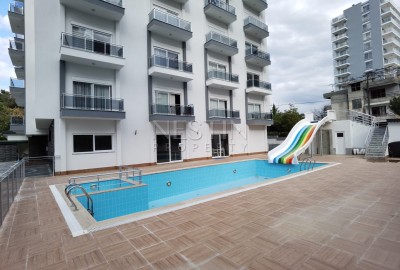 Квартира 1+1 в новом комплексе в районе Махмутлар в 300 м от моря фото 2