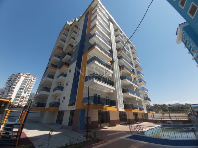 Квартира 1+1 в новом доме в районе Махмутлар фото 1