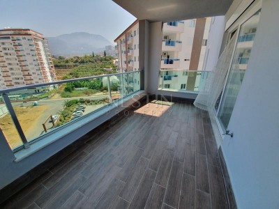 Просторная квартира 1+1 в районе Махмутлар с видом на горы фото 14