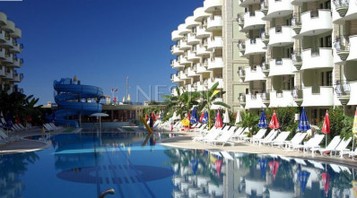 Бюджетная квартира 2+1 в районе Махмутлар в 50 метрах от моря фото 1