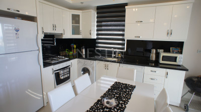 Квартира 1+1 в центре района Кестель с видом на море и горы фото 2