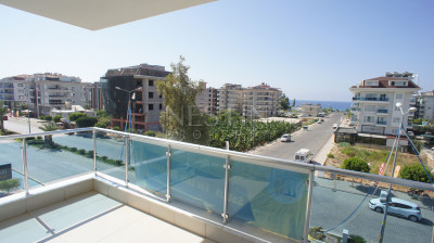 Квартира 1+1 в центре района Кестель с видом на море и горы фото 11