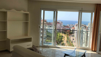 Квартира 1+1 в районе Авсаллар с видом на Средиземное море фото 1