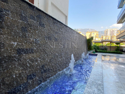 Квартира 2+1 в центре района Махмутлар на первой береговой линии фото 3