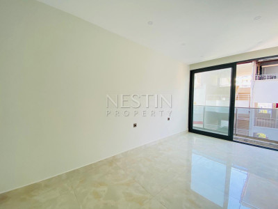 Квартира 2+1 в центре района Махмутлар на первой береговой линии фото 12