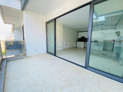 Квартира 2+1 в центре района Махмутлар на первой береговой линии фото 15