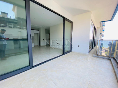 Квартира 2+1 в центре района Махмутлар на первой береговой линии фото 16