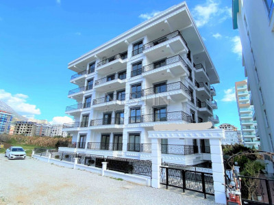 Две квартиры 1+1 в новом жилом комплексе в районе Махмутлар фото 1