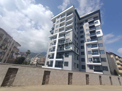 Квартира 1+1 в центре Алании с видом на горы фото 4